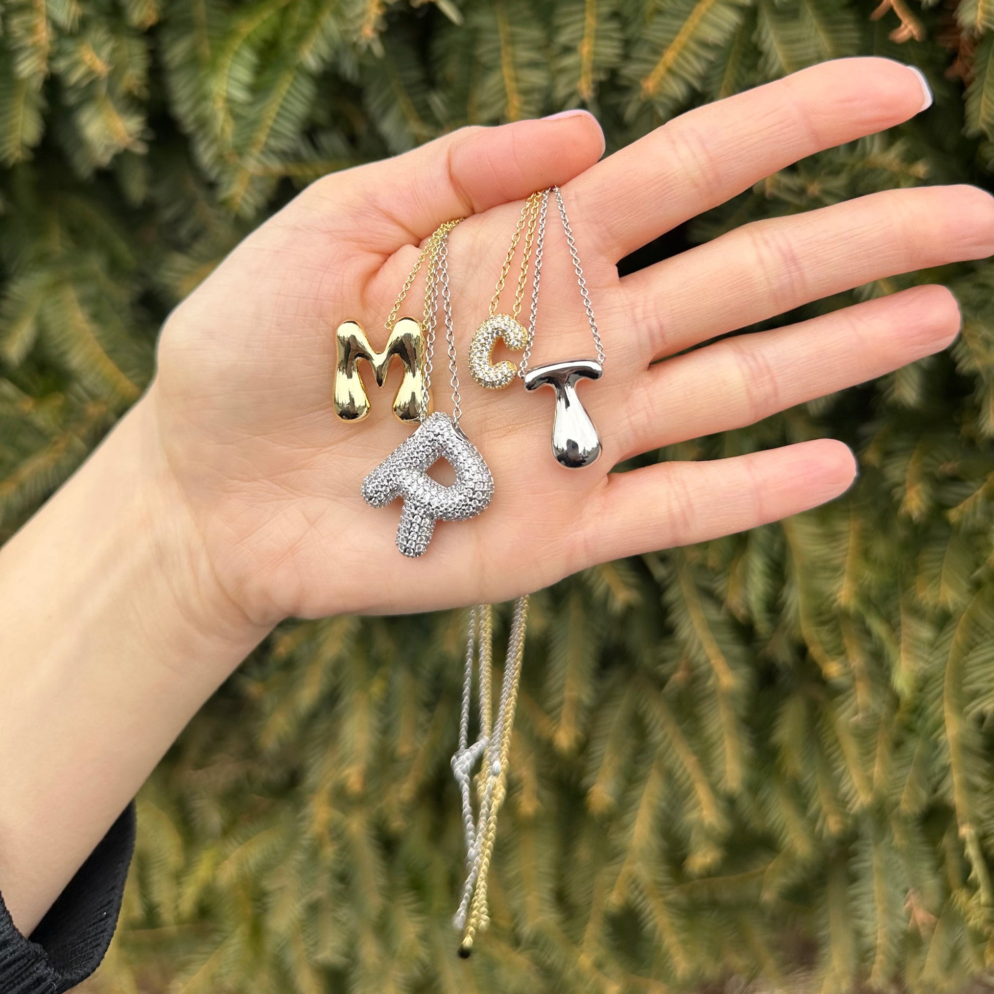 Frosted bubble letter initial necklace, inspired by Hailey Bieber, made from high-quality sterling silver for a timeless, durable, and trendy accessory. Perfect for personalized style with a chic frosted finish.