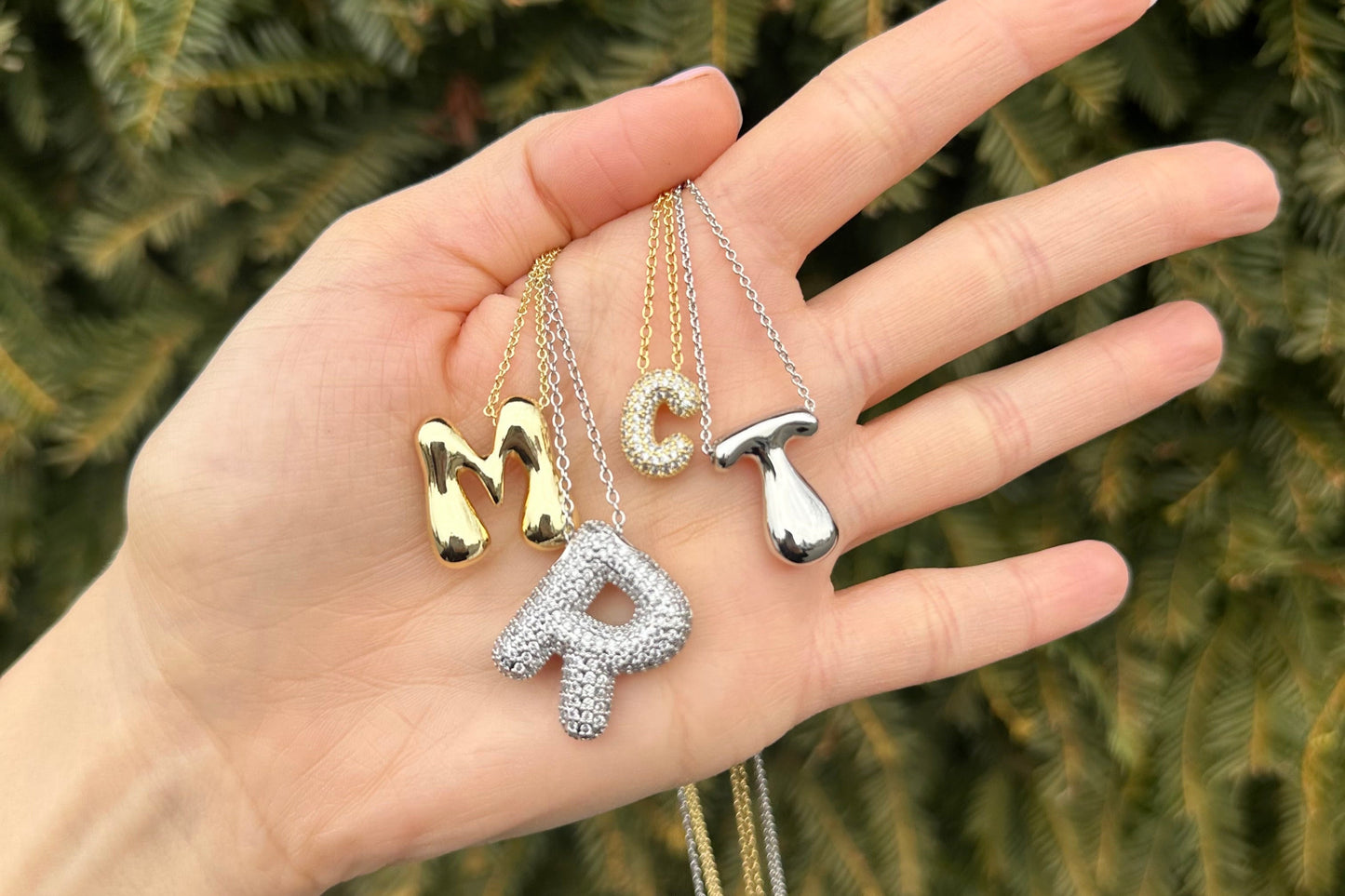 Frosted bubble letter initial necklace, inspired by Hailey Bieber, made from high-quality sterling silver for a timeless, durable, and trendy accessory. Perfect for personalized style with a chic frosted finish.